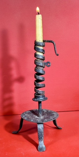 24-171. A courting candlestick on tripod base
