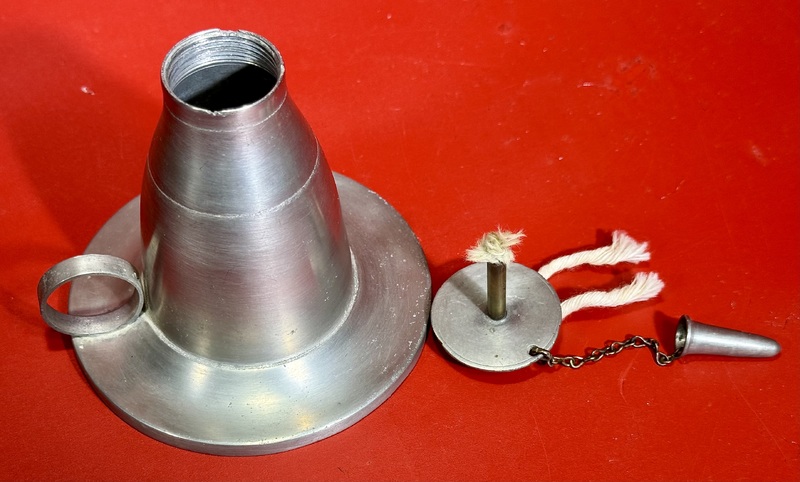 24-115. A very good pewter Fluid Finger Lamp