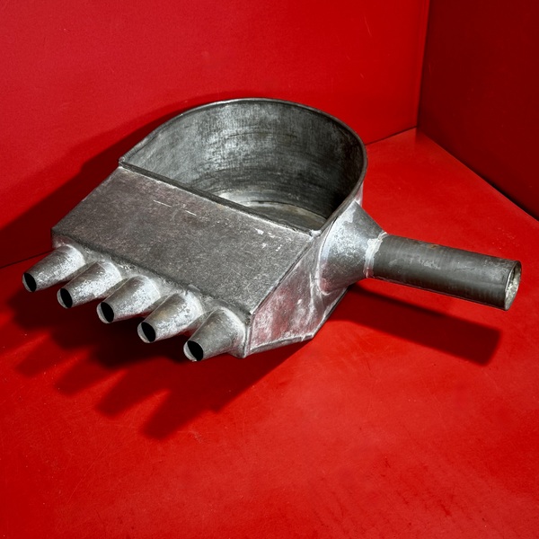 26-066. A Tin Candle Mold Wax-Filler