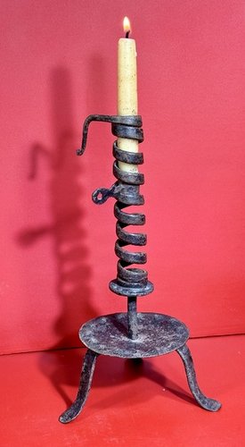 24-171. A courting candlestick on tripod base
