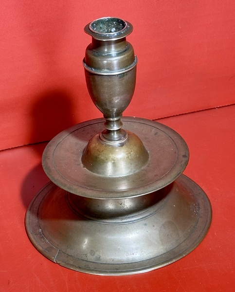 25-009. A Continental Brass "Capstan" Candlestick