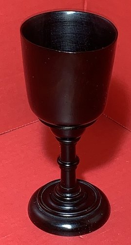 23-011. A very nicely turned Ebony cup