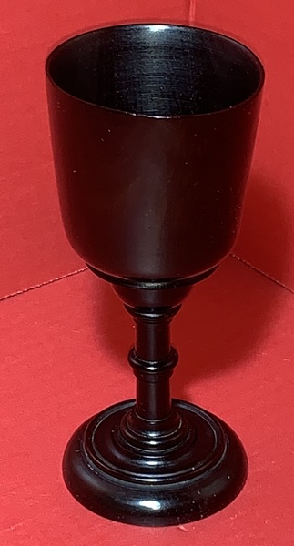 23-011. A very nicely turned Ebony cup