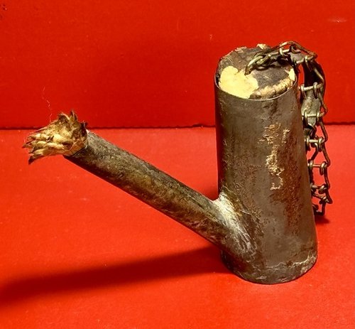 24-080. A miniature tin fluid lamp