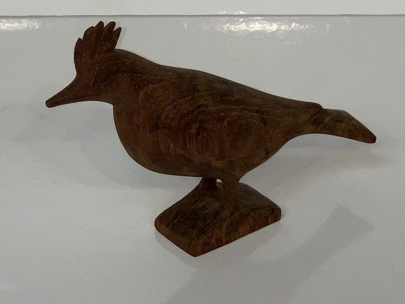 Carving of a Pileated woodpecker.