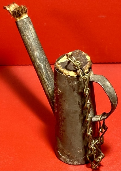 24-080. A miniature tin fluid lamp