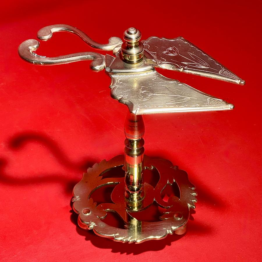25-041 An Engraved Brass Wax Jack