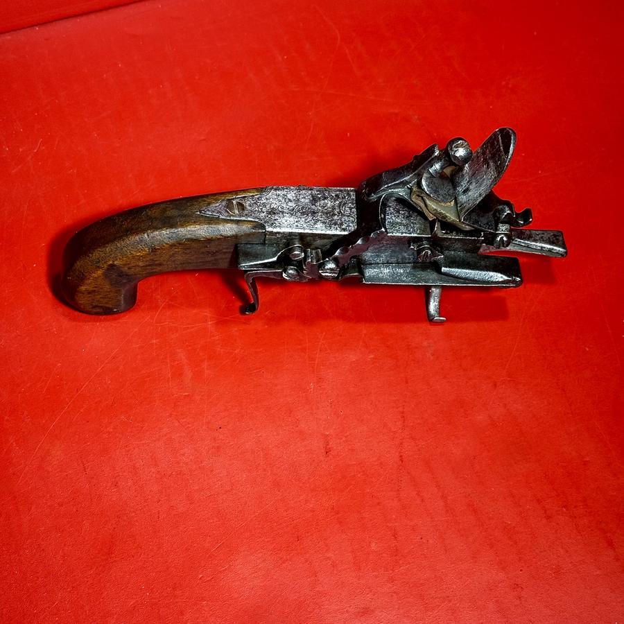 26-038. Early Flint Lock Mechanism Flint Striker