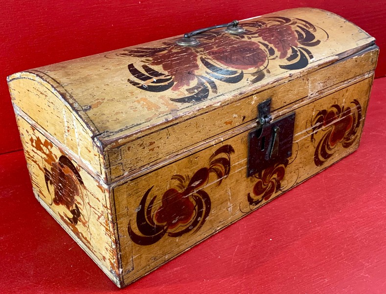 22-133. Dome top paint decorated trunk.