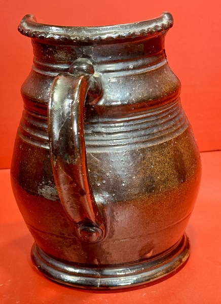 24-190. PA Redware Chamber candle holder