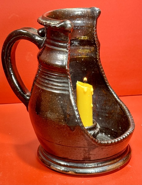 24-190. PA Redware Chamber candle holder