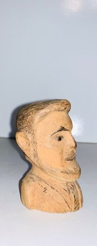 Carving of a bust of Abraham Lincoln.