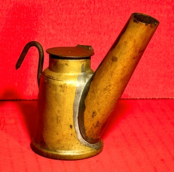 23-160. A small brass Miner's fluid lamp.