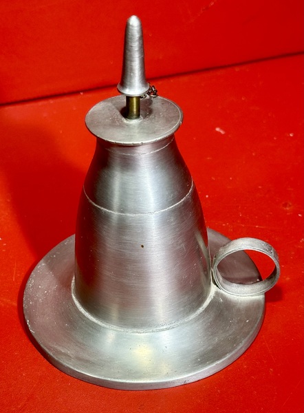24-115. A very good pewter Fluid Finger Lamp
