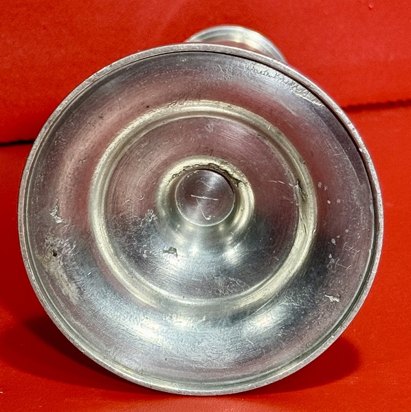 24-110. A small pewter whale oil lamp