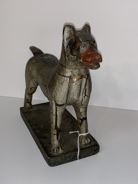 Folk Art carved standing dog.