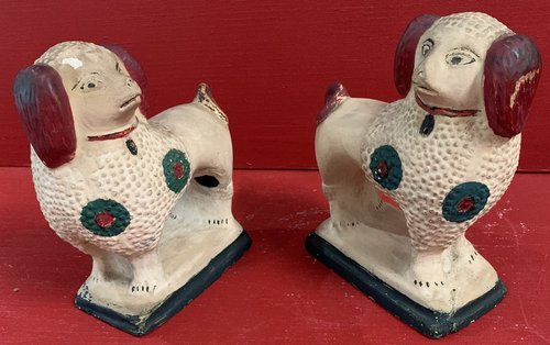 21-105. A true pair of PA chalkware Poodle dogs.