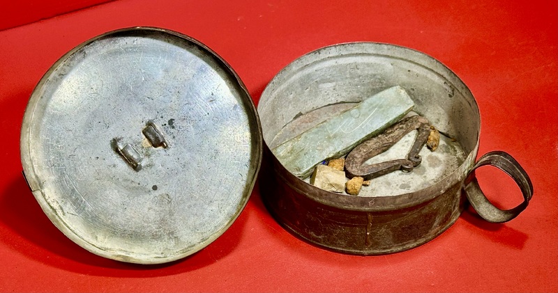 24-139. Round tin Tinder Box with candle socket