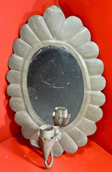24-084. A Mirrored Tin Candle Sconce