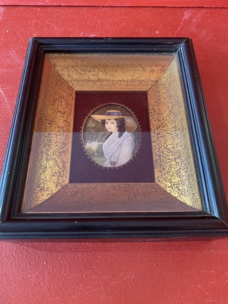22-029. Portrait miniature of a young woman.