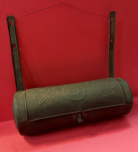 25-076. Cylindrical, pierced tin candle box