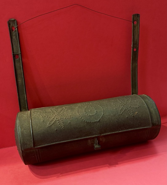 25-076. Cylindrical, pierced tin candle box