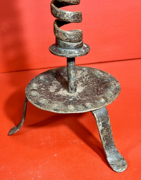 24-171. A courting candlestick on tripod base