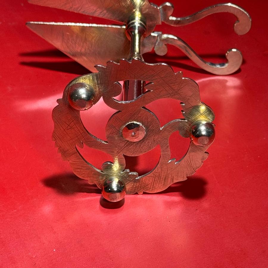 25-041 An Engraved Brass Wax Jack