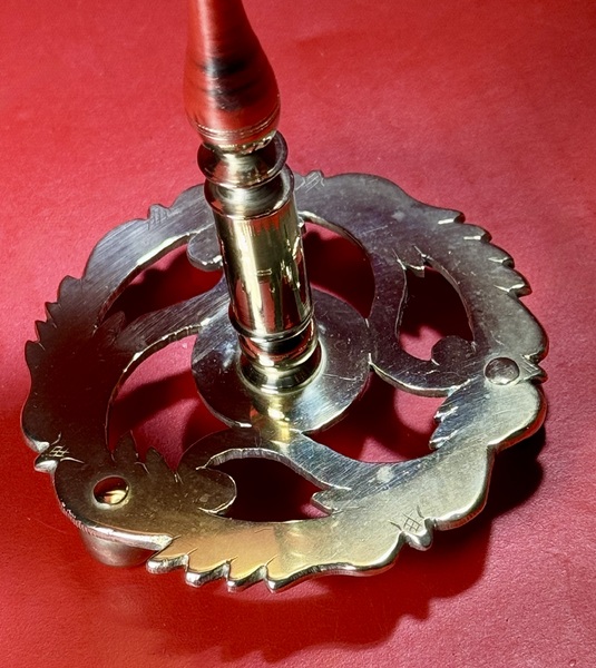 25-041. An Engraved Brass Wax Jack.