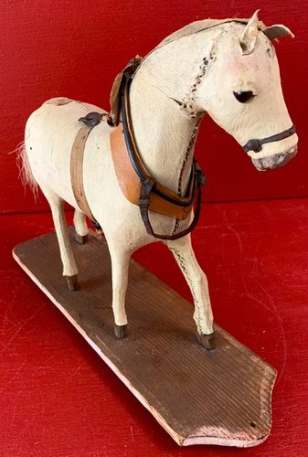 22-136. Horsehide covered carved horse