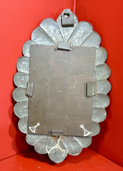 24-084. A Mirrored Tin Candle Sconce