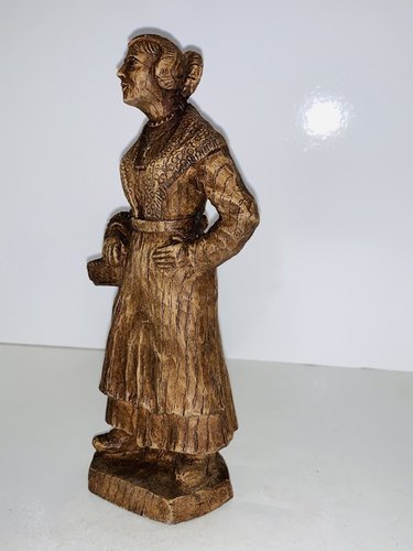 Carved Peasant Woman with a basket.
