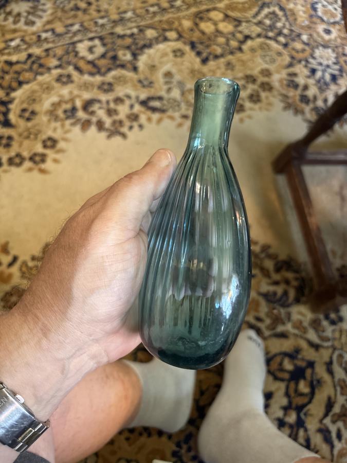 Early 19th century ribbed open pontil glass flask