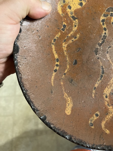 Early 19th century Pa. Redware dish with slip desi
