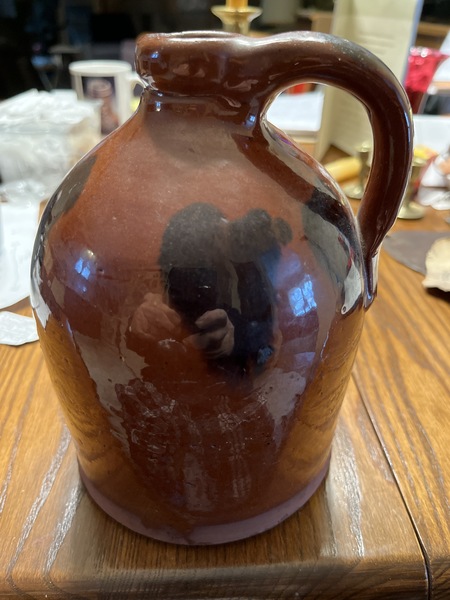 Early 19th century Red-ware jug with slip decorati