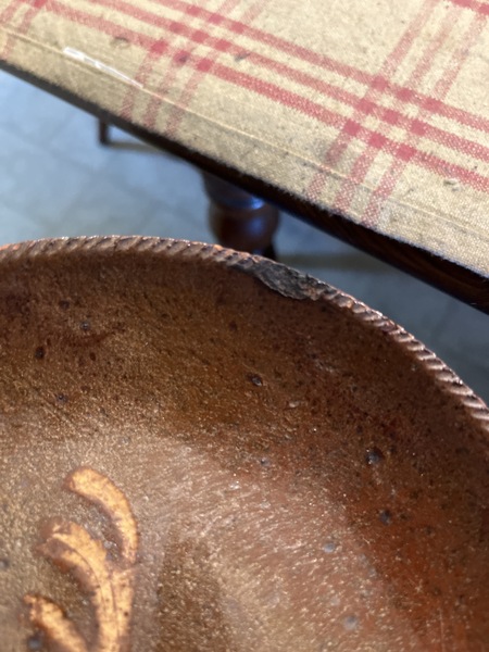 Early 19th century slip decorated pa. Eating dish
