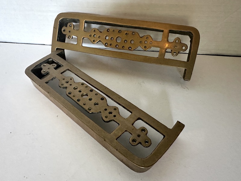 An Early Two Piece Brass Trivet to Extend to Size