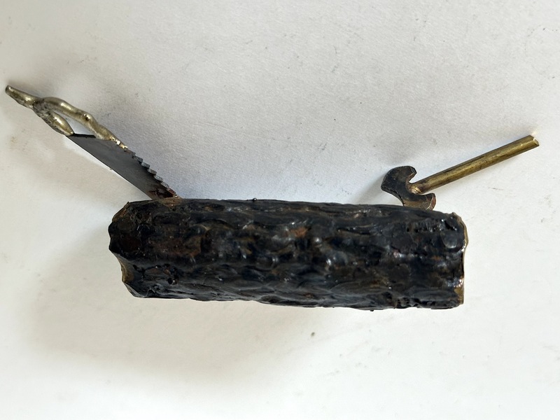 Folkart Painted Paperweight Log Saw and Axe Motif