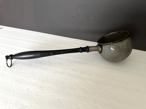 Labeled Early Granite Iron Ware Scoop Wood handle.